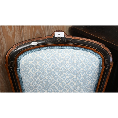 83 - Victorian Aesthetic movement burr walnut and ebonized nursing chair with paisley upholstery