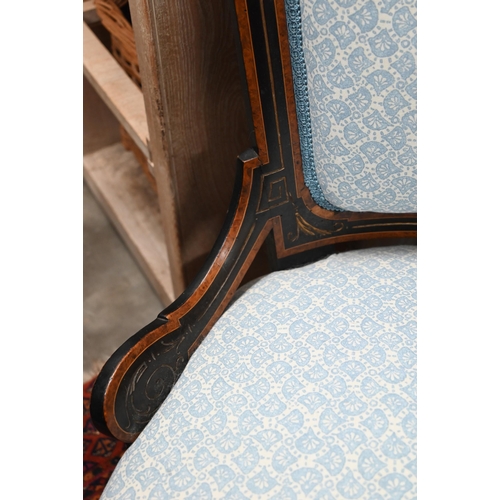 83 - Victorian Aesthetic movement burr walnut and ebonized nursing chair with paisley upholstery