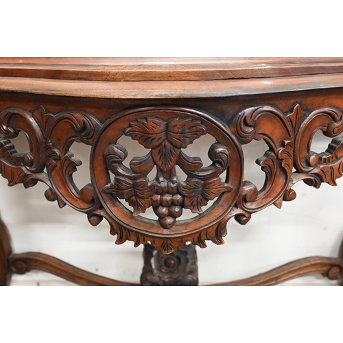 84 - A Rococo style carved hardwood serpentine front console table and mirror, 138 x 50 x 234 cm h