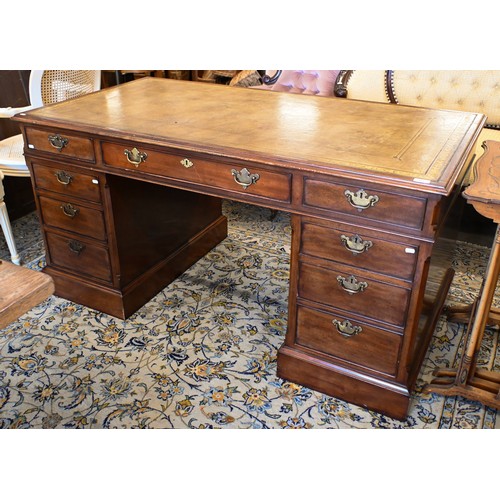 159 - A mahogany twin pedestal desk with gilt tooled green leather top over nine drawers, 150 x 80 x 76 cm... 