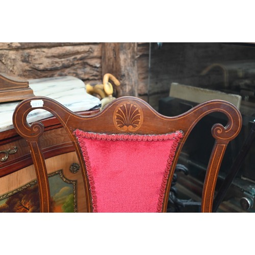 64 - An Edwardian walnut and shell inlaid elbow open armchair with burgundy upholstery