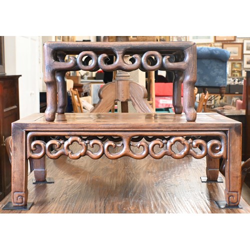 116 - A Chinese hardwood coffee table with fret-cut scroll frieze, 76 x 40 x 28 cm to/w a similar smaller ... 