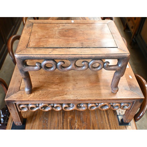 116 - A Chinese hardwood coffee table with fret-cut scroll frieze, 76 x 40 x 28 cm to/w a similar smaller ... 