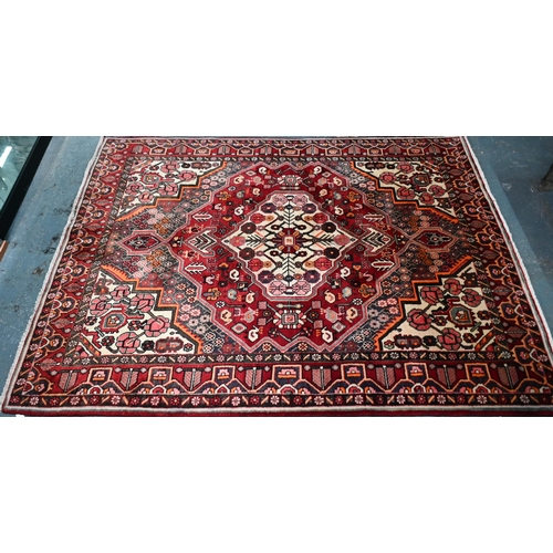 79 - A contemporary central Persian Bakhtiar camel ground rug, 203 cm x 154 cm