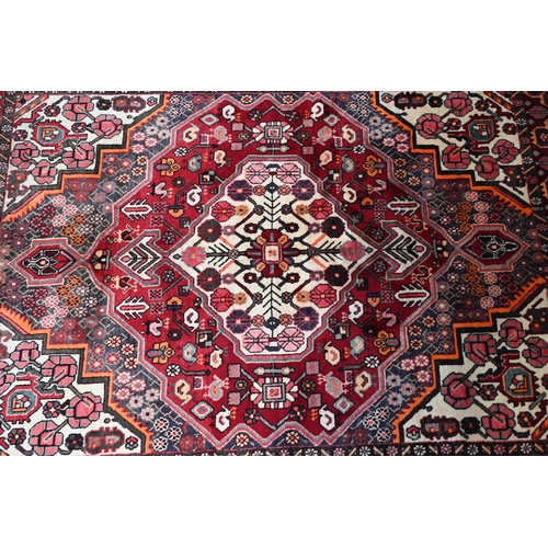 79 - A contemporary central Persian Bakhtiar camel ground rug, 203 cm x 154 cm