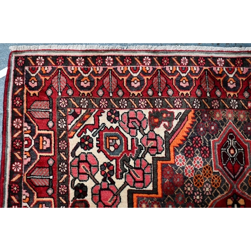 79 - A contemporary central Persian Bakhtiar camel ground rug, 203 cm x 154 cm