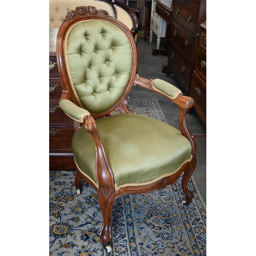 100 - Victorian mahogany framed open armchair, green buttonback upholstery