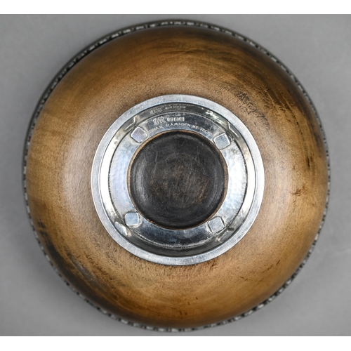 62 - Omar Ramsden: a silver-mounted turned maple wood mazer bowl, the flaring silver rim applied with ban... 