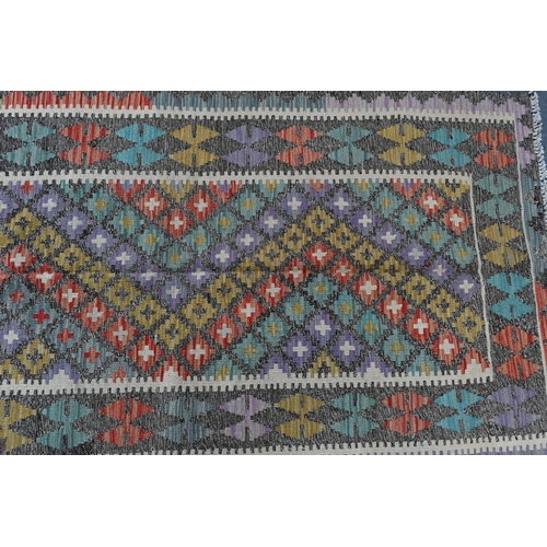 142 - An contemporary Anatolian Kelim, the geometric design in pastel dyes, 194 cm x 106 cm