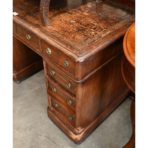 107 - A small Victorian mahogany twin pedestal desk with nine drawers, 104 cm w x 58 cm d x 72 cm h  (a/f)