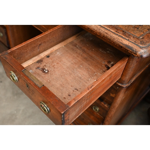 107 - A small Victorian mahogany twin pedestal desk with nine drawers, 104 cm w x 58 cm d x 72 cm h  (a/f)