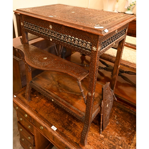 108 - A late 19th century Syrian profusely carved hardwood occasional table inlaid with mother-of-pearl st... 