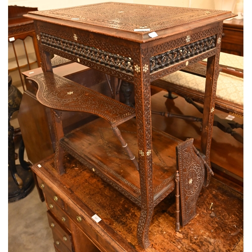 108 - A late 19th century Syrian profusely carved hardwood occasional table inlaid with mother-of-pearl st... 