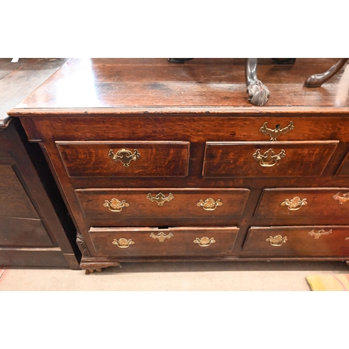 114 - An 18th century oak sideboard (converted) with an arrangement of seven drawers between fluted quarte... 