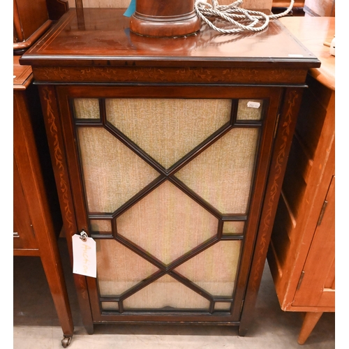 117 - A rosewood inlaid music cabinet with astragal glazed door enclosing fixed shelves