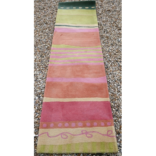 118 - A modern Indian made 'all spice' multi-coloured wool runner, 244 x 65 cm