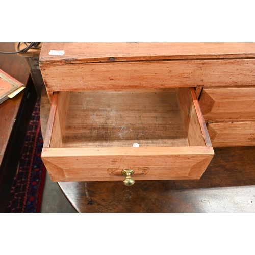 121 - A vintage pine table top tool chest with seven drawers, 90 x 22 x 27 cm h, to/w an Edwardian pine ca... 