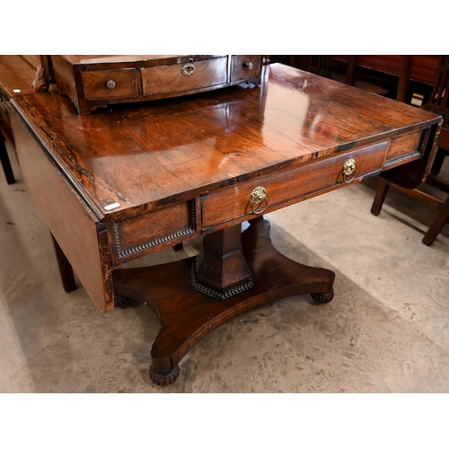 123 - A Regency rosewood sofa table with frieze drawer, on hexagonal pillar and platform base, 134 cm