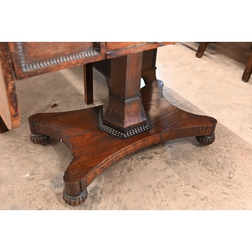 123 - A Regency rosewood sofa table with frieze drawer, on hexagonal pillar and platform base, 134 cm