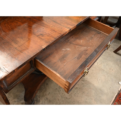 123 - A Regency rosewood sofa table with frieze drawer, on hexagonal pillar and platform base, 134 cm