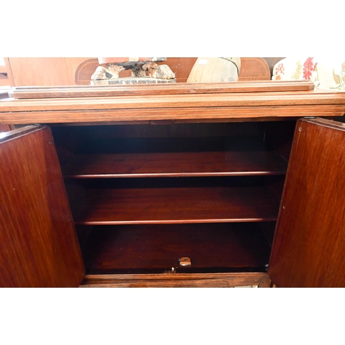 125 - An Edwardian inlaid rosewood music cabinet with mirrored doors, 62 cm wide