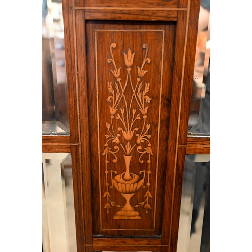 125 - An Edwardian inlaid rosewood music cabinet with mirrored doors, 62 cm wide