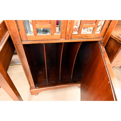 125 - An Edwardian inlaid rosewood music cabinet with mirrored doors, 62 cm wide