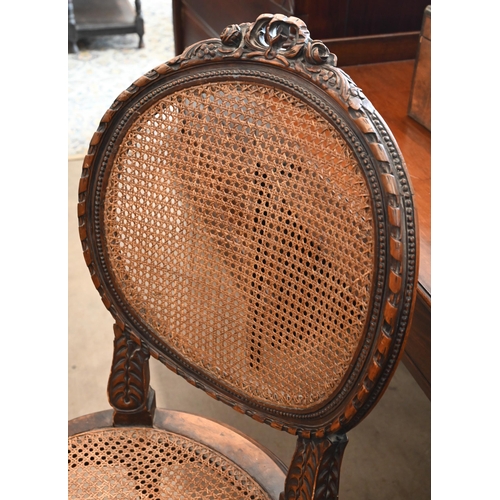 127 - Two pairs of French carved frame salon chairs with caned seats and backs (1 a/f)