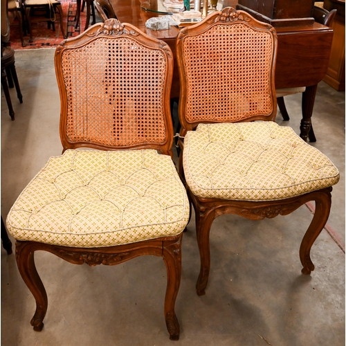 127 - Two pairs of French carved frame salon chairs with caned seats and backs (1 a/f)