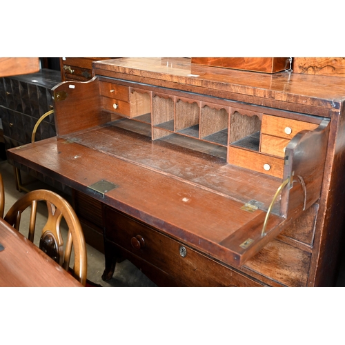 130 - A George III mahogany secretaire chest with fitted drawer above three long drawers, on French bracke... 