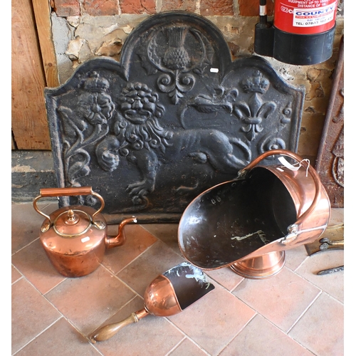 145 - A substantial old cast iron armorial fire back dated 1644, 79 cm x 71 cm to/with an antique copper f... 