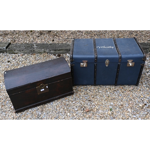 146 - An old wooden dome top trunk, to/w a blue canvas luggage trunk, stencilled 'PJ Wheatley' (2)