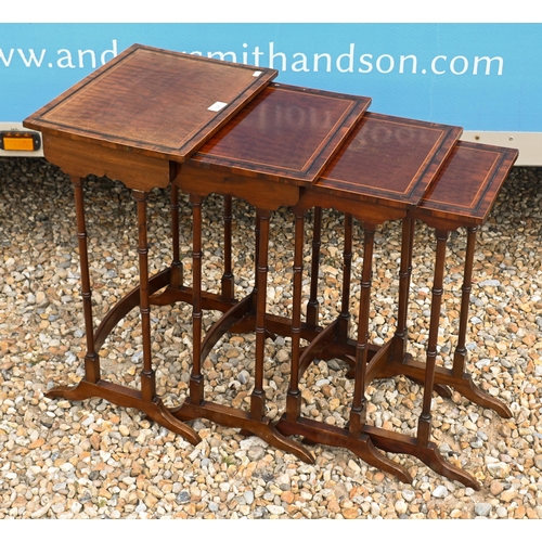 155 - A nest of satinwood quartetto tables, raised on faux bamboo supports, the largest 42 x 32 x 65 cm h