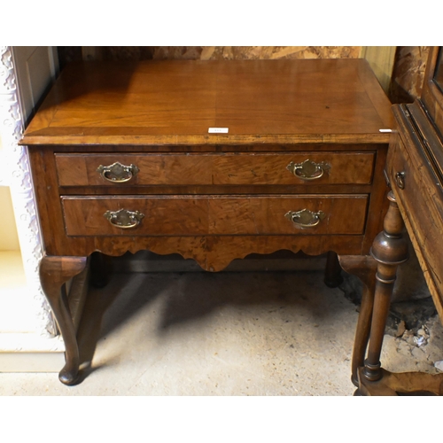 157 - An antique walnut two drawer side table, raised on cabriole legs, 79 x 49 x 71 cm h