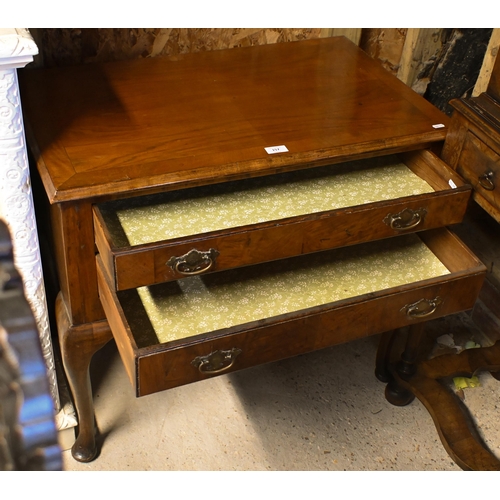 157 - An antique walnut two drawer side table, raised on cabriole legs, 79 x 49 x 71 cm h