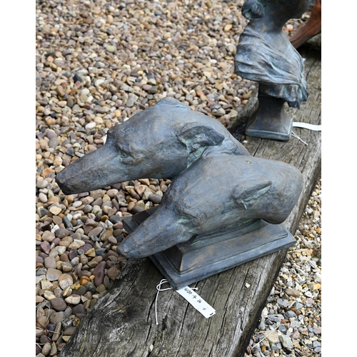 16 - A reconstituted cast stone garden ornament of two greyhound heads in aged bronzed finish, 28 cm high