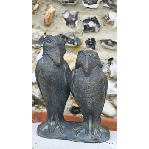 23 - A reconstituted cast stone garden ornament of two grotesque 'Wally' birds in the manner of the Marti... 