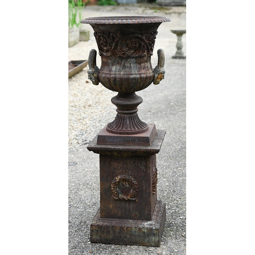 30 - A large pair of old weathered cast iron Campagna urn planters, raised on square pedestal bases, 112 ... 