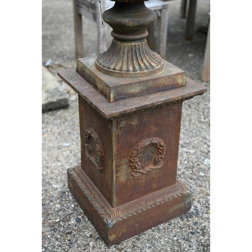 30 - A large pair of old weathered cast iron Campagna urn planters, raised on square pedestal bases, 112 ... 