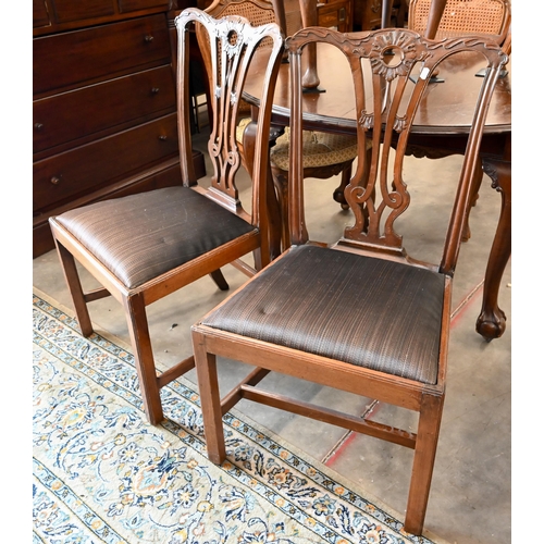 40 - # A  pair of 19th century mahogany standard dining chairs in the Chippendale manner, with carved and... 