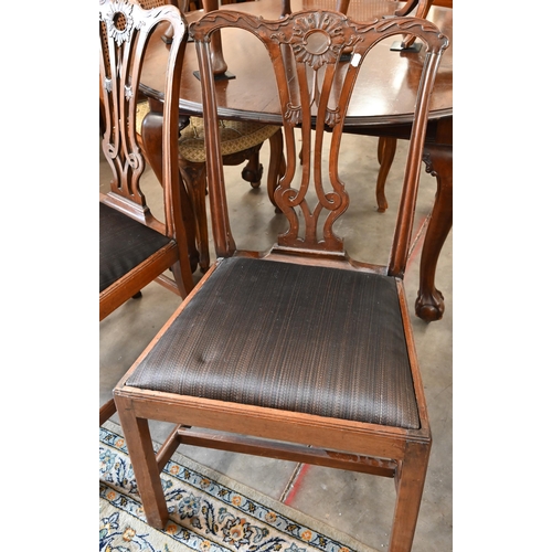 40 - # A  pair of 19th century mahogany standard dining chairs in the Chippendale manner, with carved and... 