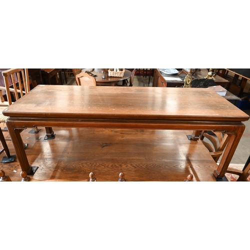 41 - # A Chinese style hardwood coffee table on moulded square supports (with partial label for Lysberg, ... 