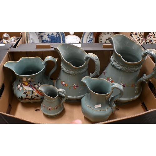 420 - Three Victorian Ridgway green-glazed jugs in differing sizes, with moulded decoration and floral pri... 