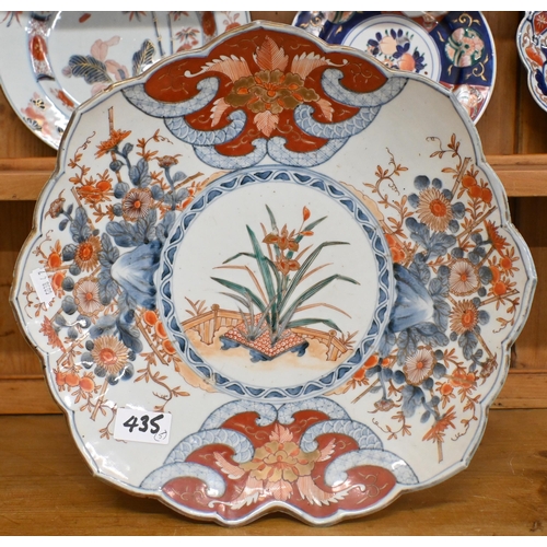 435 - A pair of 19th century Imari palette porcelain plates, painted with bamboo, 23 cm to/w a Japanese Im... 