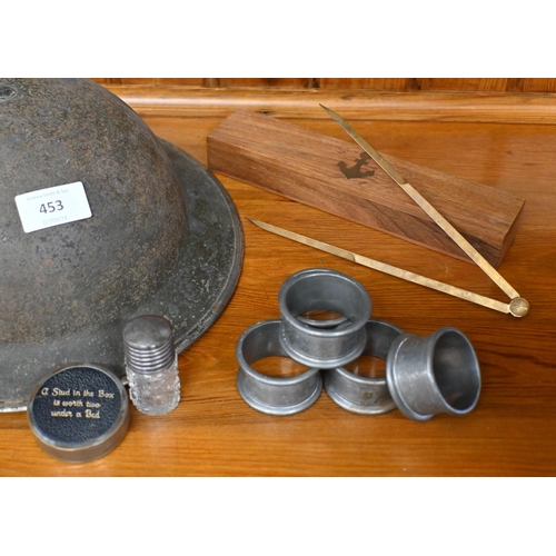 453 - A World War II British steel helmet, to/w an Edwardian slate clock, various costume jewellery and Ar... 