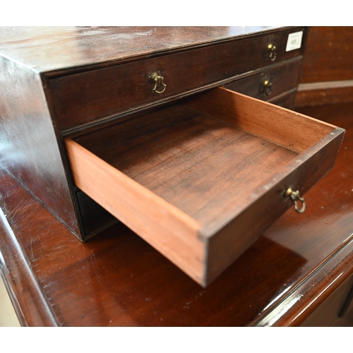 459 - A Georgian mahogany small set of six collector's drawers with brass loop handles, 38 cm wide to/w a ... 