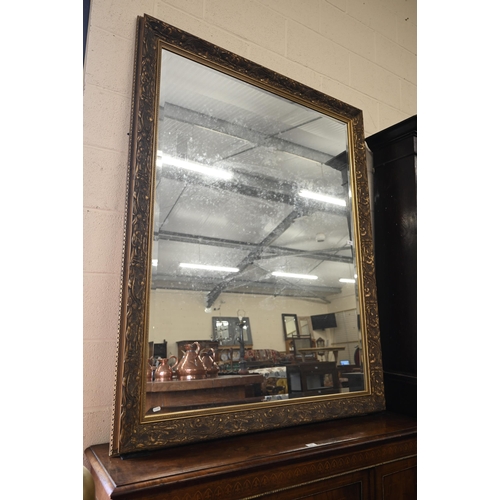 46 - A large gilt framed wall mirror with bevelled plate, 158 x 125 cm