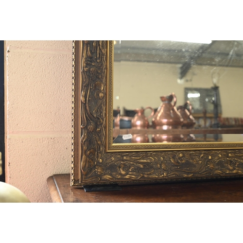 46 - A large gilt framed wall mirror with bevelled plate, 158 x 125 cm