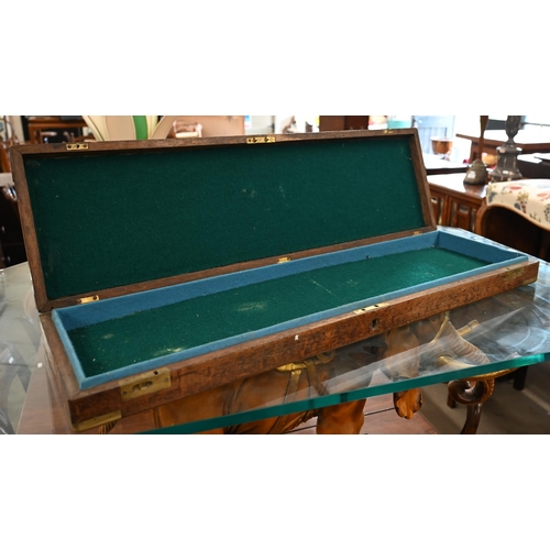 462 - An antique brass-bound oak gun-case (no interior fittings) 82 cm long overall