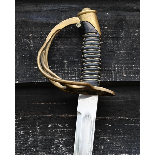 469 - An antique German cavalry sabre with 88 cm curved and fullered blade, brass basket guard and wired l... 